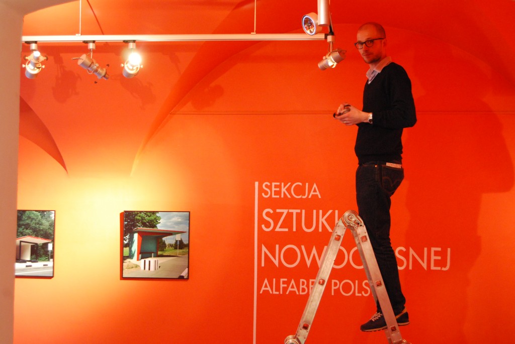 Nicolas Grospierre installing his artwork at Polish Aphabet project, 2009, from the archive of BWA Tarnów 