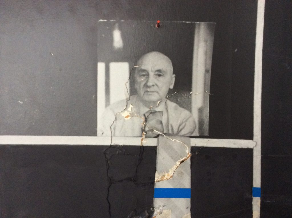 A photograph of Henryk Stażewski, with blue-taped tie. Edward Krasiński’s studio apartment, Warsaw, Poland, 2016 PrevNext