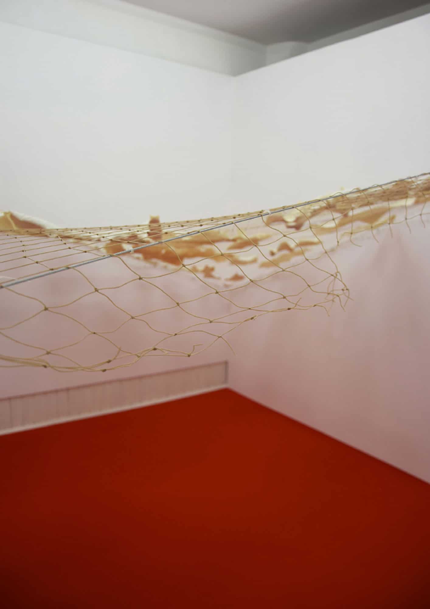 Justyna Mędrala, Destructive tendencies (installation view) 400x400 cm 2016 soap, fabric grid, carpet