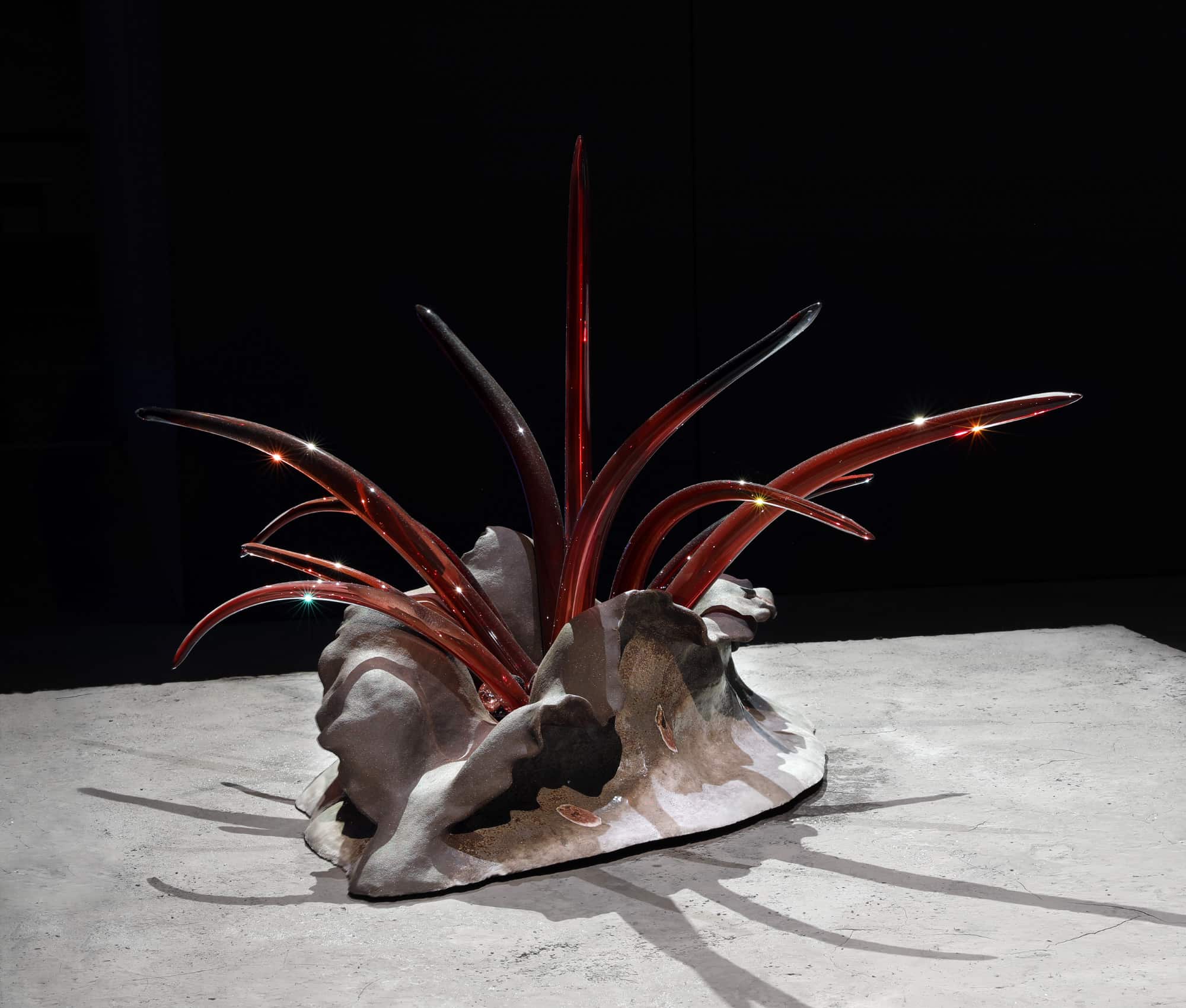 Khthon, 2019, glazed stoneware and porcelain, blown and thermoformed glass, stained concrete