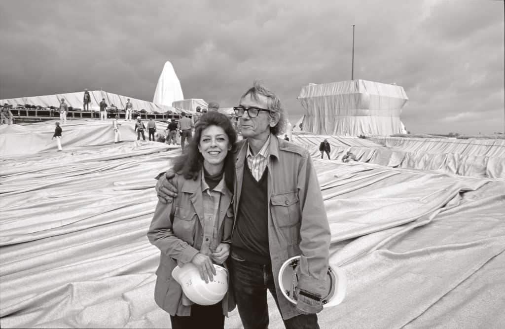 Christo and Jeanne Claude during the installation of Wrapped Reichstag, Berlin 1995 photo: Wolfgang Volz © Christo, Wolfgang Volz