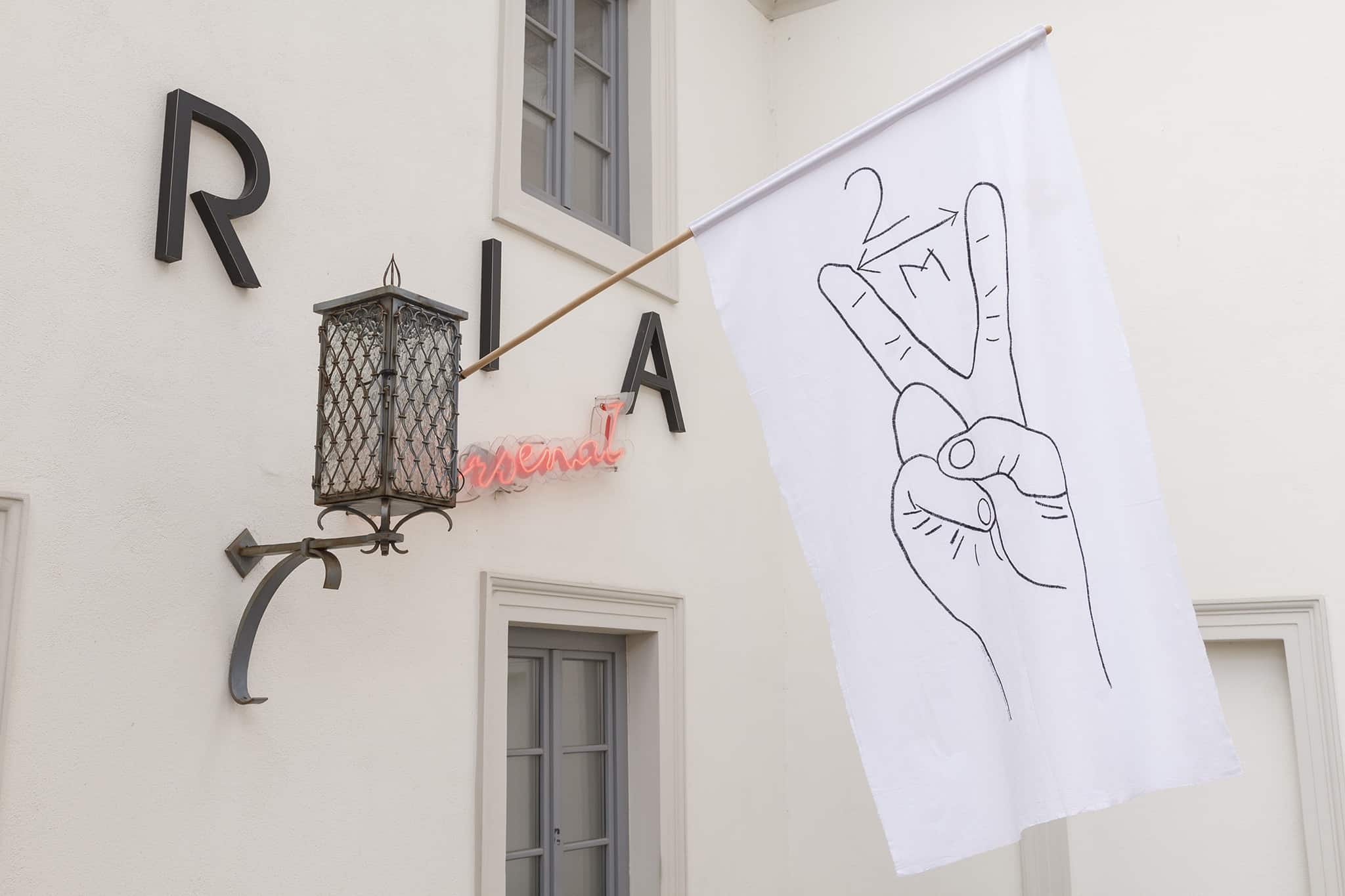 Monika Drożyńska, Two, flag, hand embroidery on cotton fabric (presentation in real space), 70 × 100 cm, photo: M. Zaniewski, Arsenal Gallery in Białystok