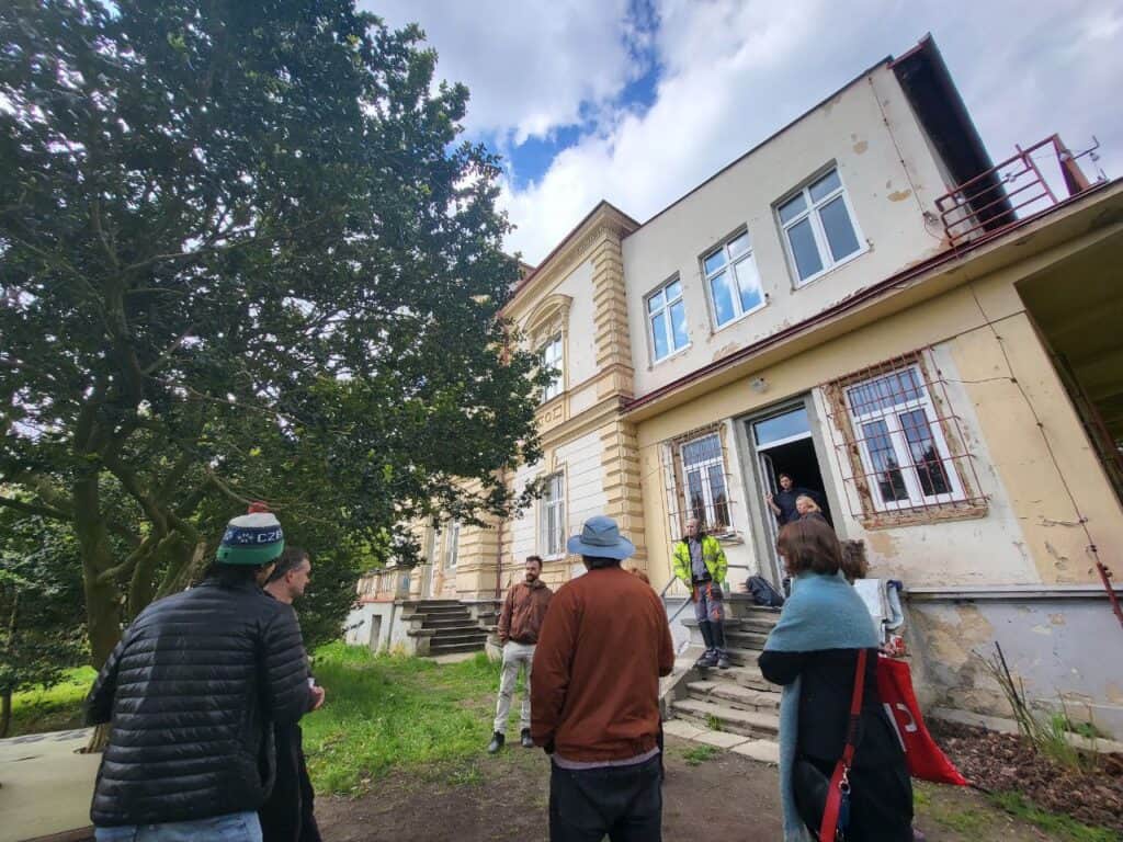 Visiting the neighbour's house in Libuše.