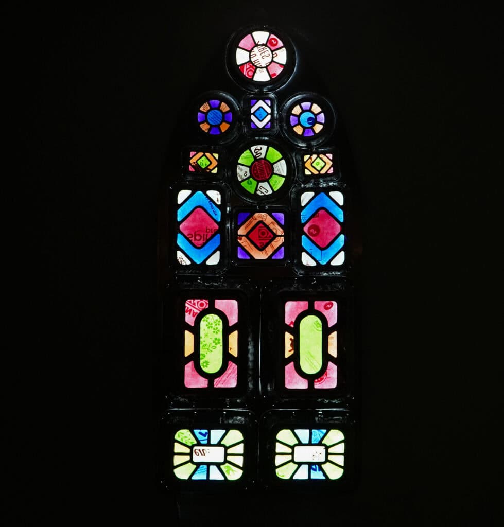 Ty Locke, Rituals (Gothic), 2025. Alumnium food containers, shopping bags, LED lights, alumnium backing. 157 x 67 x 9 cm. Courtesy of the Artist and Copperfield, London. Copyright the Artist_
