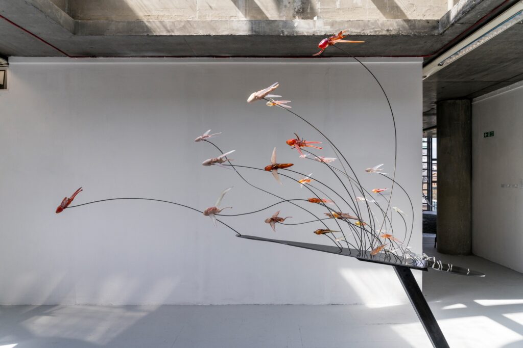 Vladimir Lalić, Flying Dickheads (installation view), resin, metal, metal dust, audio, 550x420x80cm, 2024. Courtesy of the artist