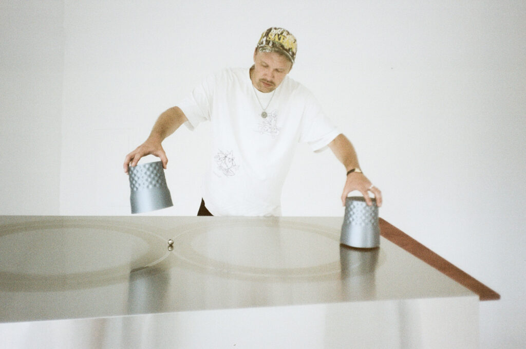 Mikelis Murnieks setting up _The Game_, 2025, photo by Evija Kristopane. Courtesy of the artist