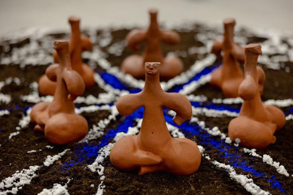 Aleksandra Szczodry, The Six Clan Mothers, H: 22 cm, and the HEX collective's magic circle, Photo: Damian Krzanowski, BWA Krosno. Courtesy of the artist