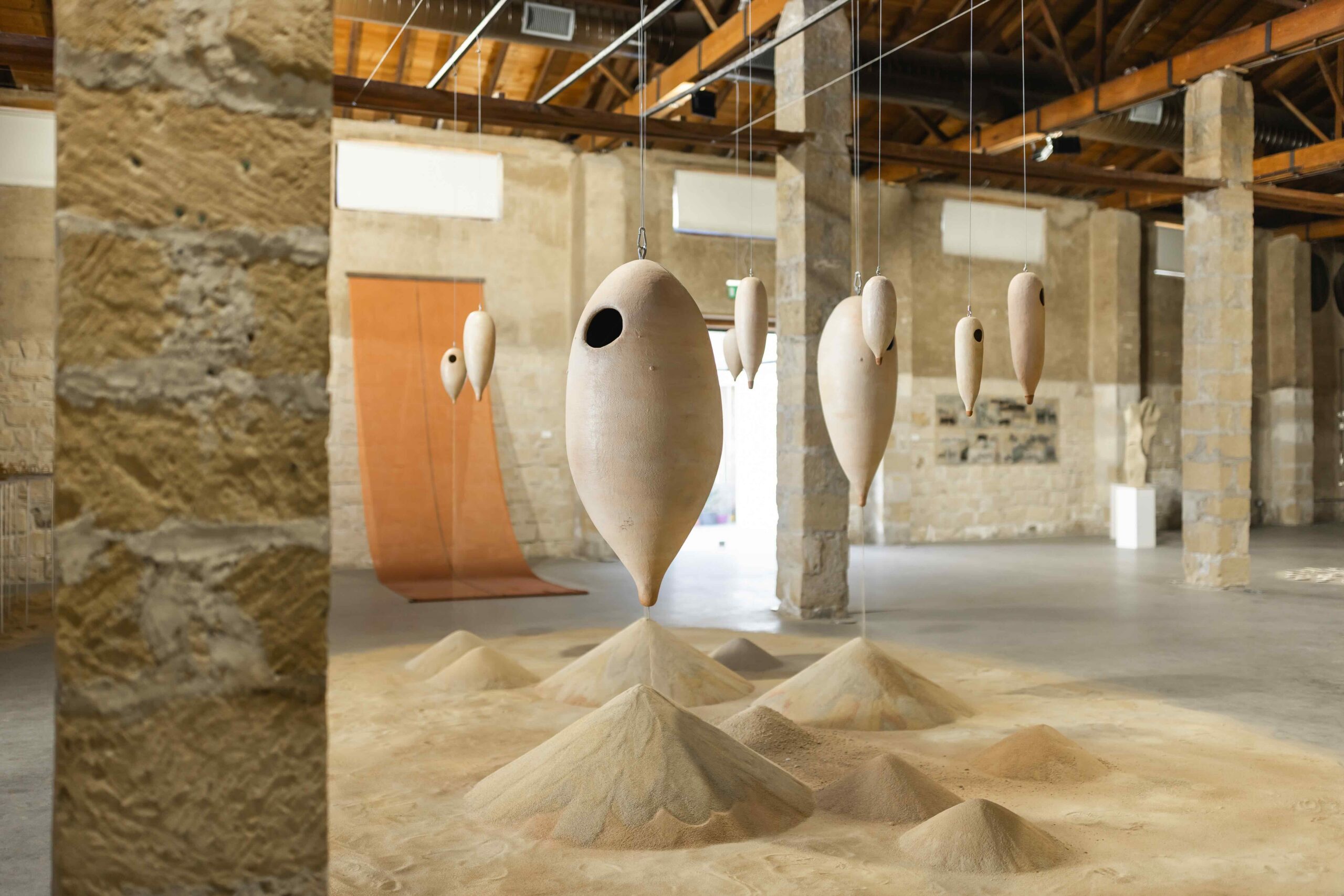 "Along Lines and Traces", Larnaca Biennale 2025. Foreground Artist Karma Barnes Grand Prix Winner of Larnaca Biennale 2025, Apothiki 79. Photo by Emma Louise Charalambous
