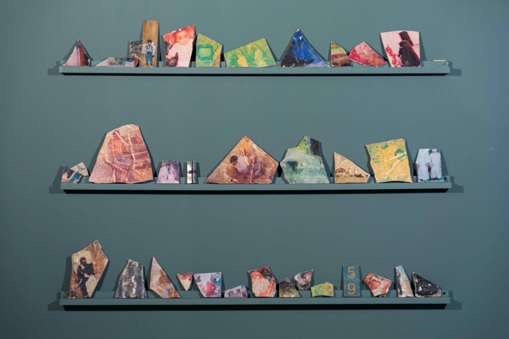 Salmah Almansoori, Who I Become, 2023-2026, photo transfer, acrylic and oil paint on found objects. Installation view at Maraya Art Centre, Sharjah, 2026.