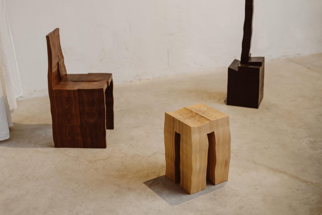 Aleksander Oniszh, Chair (left), Stool (middle), Candlestick (right), 2026. View of the exhibition "Crafting Reality" at Pasaje94, Valencia, 12.09–31.10.2026. Photo by Alka Murat
