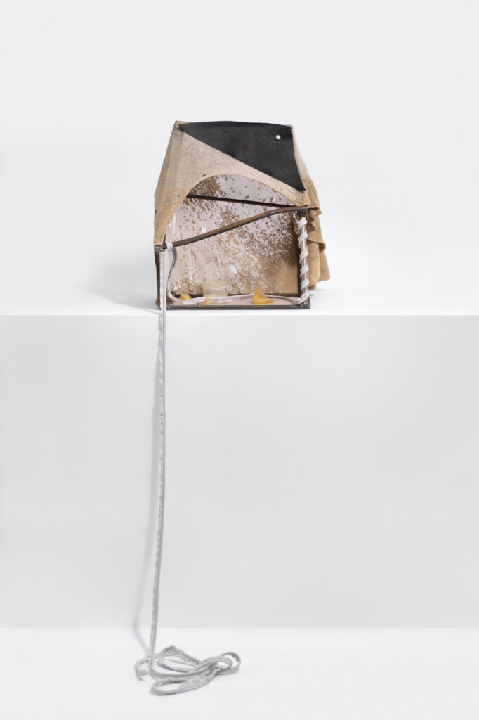 Linda Lach, This relief might feel unusual, 2025, rusted steel, cotton, rattan, human milk, latex, leather 37,5 x 33 x 23 cm